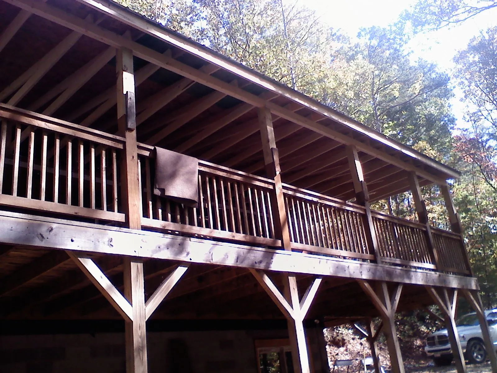 Timber framing under a new elevated porch and deck — Roof Leak Repair in Dansville by Roofing Brothers